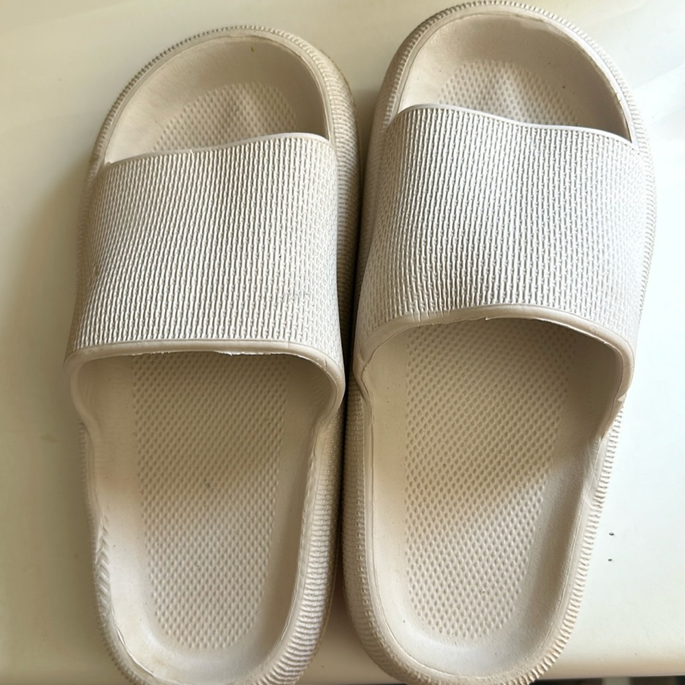 Slides for girls size 5 color cream worn but still in a good condition
